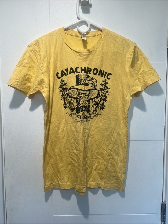 Next Level Apparel Other - Next Level Apparel Yellow Short-Sleeve 'Catachronic Emporium' Graphic Tee